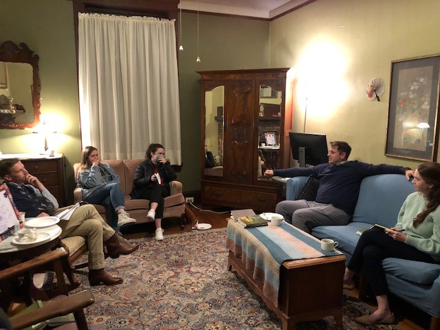 Conyers Scholars in a living room discussion